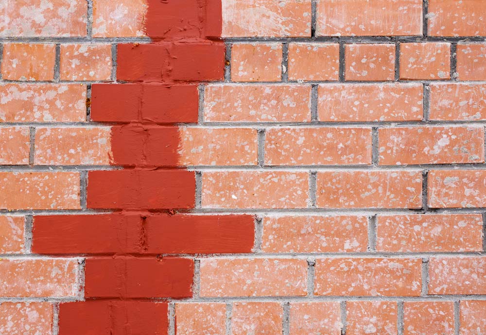 appliquer-scellant-mur-briques-et-pierres